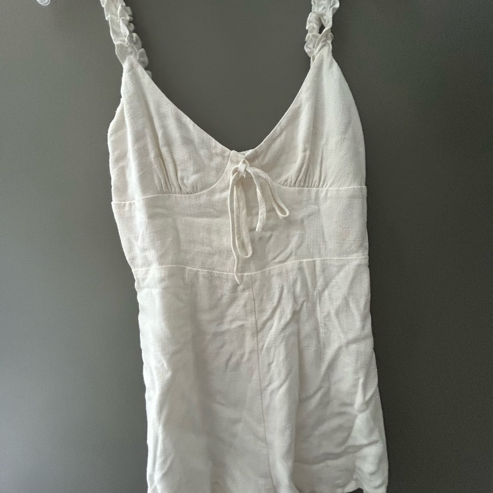 Couple of white and pink dresses along with a shirt!